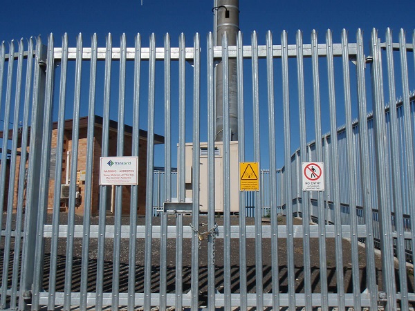 Locked spiked security gates for an industrial or commercial building.